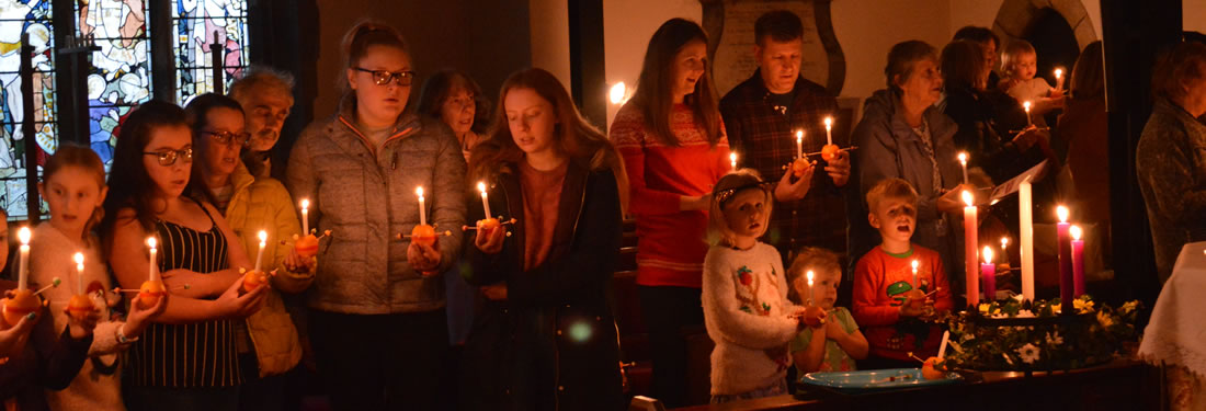 Families and young people at the annual Christingle service.
